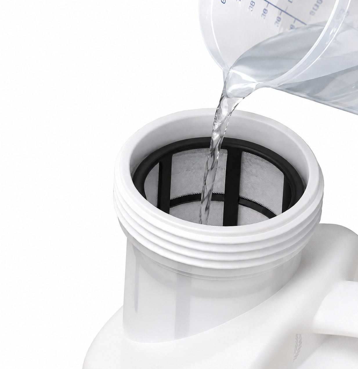 Pouring premixed solution from a measuring cup through the strainer at the wide-mouth tank opening
